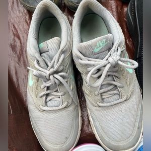 Light blue and gray size 10 Nike tennis shoes